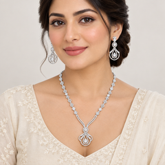 Adult model wearing the AD Zircon necklace and matching earrings