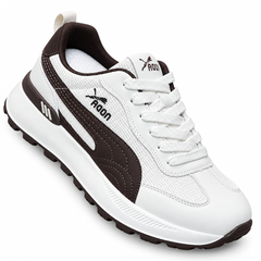 White sneaker with dark accents on white background
