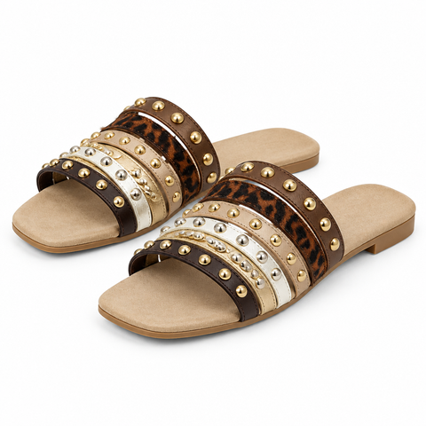 Studded sandals on a white background