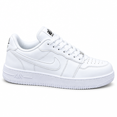 White ladies’ sneaker on a clean white background